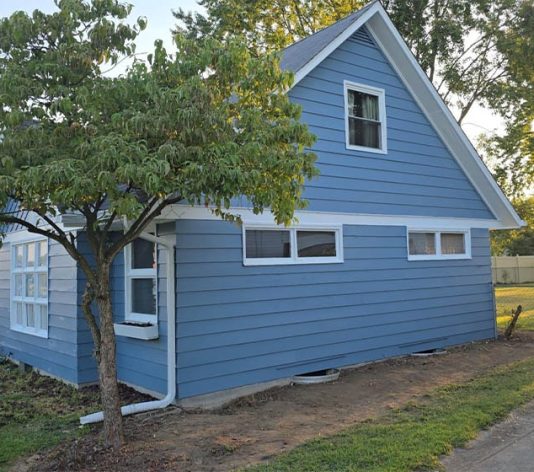 freshly painted blue on residential house