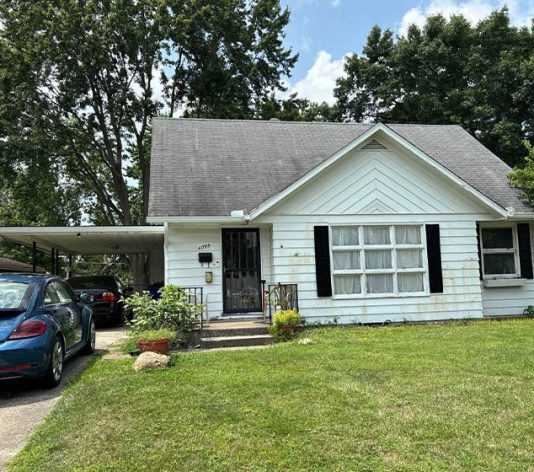 front view of residential house before new paint