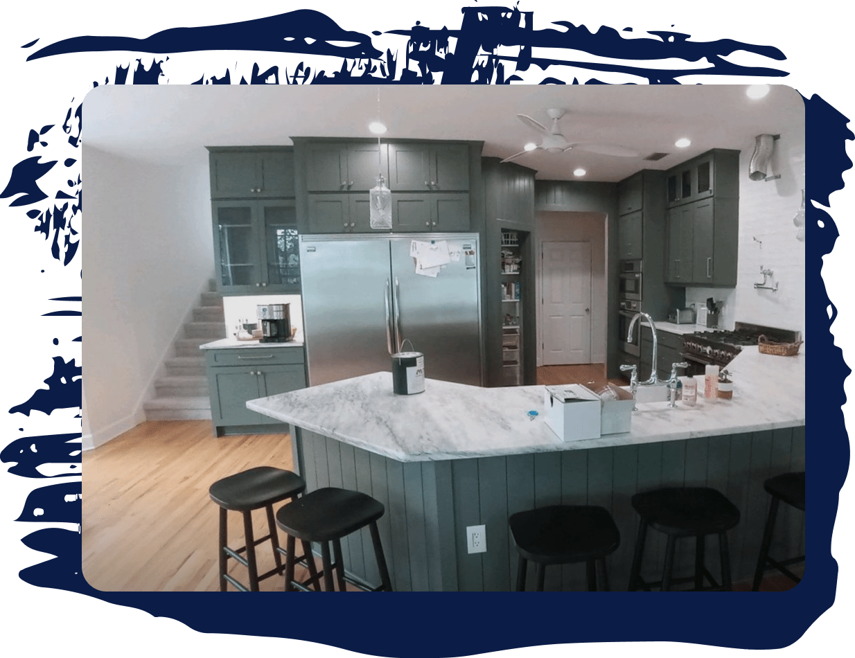 inside of kitchen with fresh green cabinets